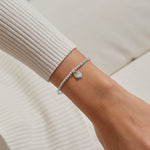 Joma Jewellery beaded stretch bracelet with padlock style heart charm with sparkly star detail presented on foil stamped sentiment card.