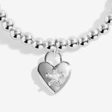Joma Jewellery beaded stretch bracelet with padlock style heart charm with sparkly star detail presented on foil stamped sentiment card.