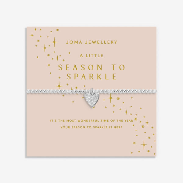 Joma Jewellery Christmas Season To Sparkle beaded bracelet with haning heart charm presented on festive sentiment card.