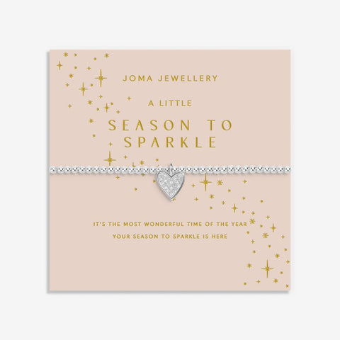 Joma Jewellery Christmas Season To Sparkle beaded bracelet with haning heart charm presented on festive sentiment card.