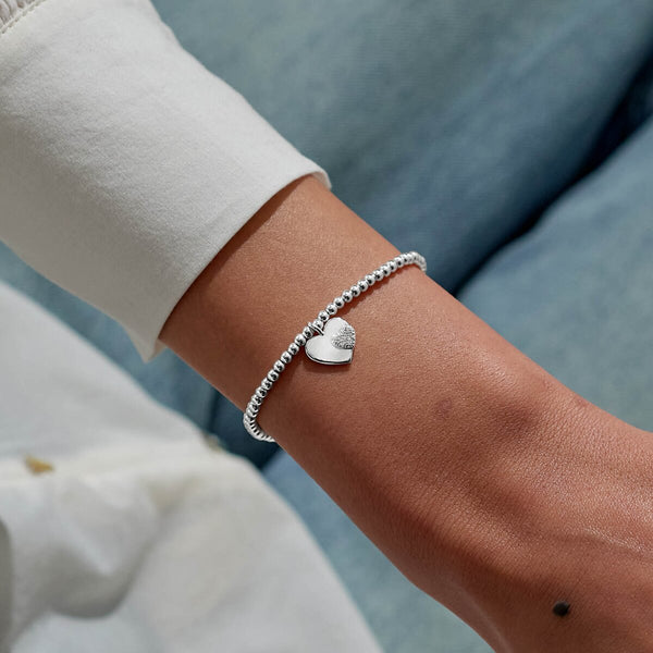 Joma Jewellery Christmas silver plated beaded bracelet for Mum presented on a festive gifting card.