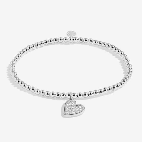 Merry Christmas Lovely Daughter Joma bracelet with silver plated beads and sparkling hanging heart charm.
