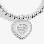 Joma Jewellery stretch beaded bracelet for a Wonderful Nana with solid hanging heart charm with sparkle detail presented on a foil stamped sentiment card.