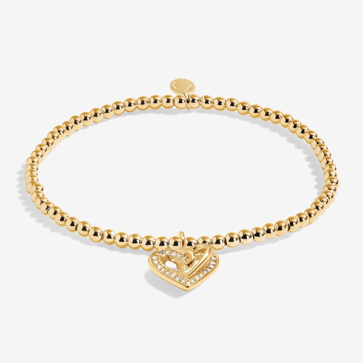 Gold plated Joma Jewellery bracelet for a friend with an open heart hanging charm with sparkle detail. Presented on a foil stamped sentiment card.