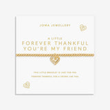 Gold plated Joma Jewellery bracelet for a friend with an open heart hanging charm with sparkle detail. Presented on a foil stamped sentiment card.