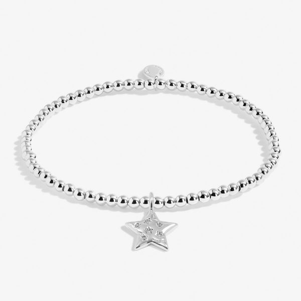 Joma Jewellery Merry Christmas teacher silver plated beaded bracelet with sparkling hanging star charm presented on festive gifting card.