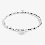 Joma Jewellery 'a little' bracelet with pretty little charm, presented on a sentiment card which reads:  'this little bracelet is just to say you're a wonderful Maw in every way'