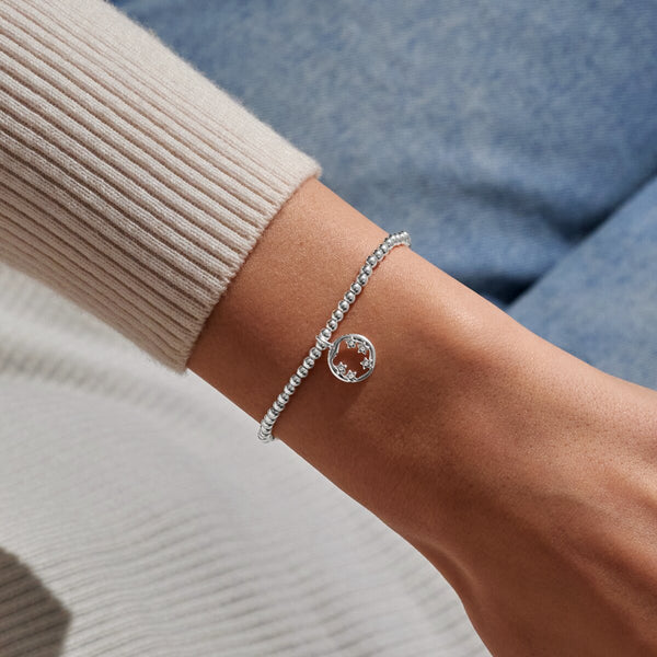 Joma Jewellery silver plated stretch beaded bracelet with hanging charm featuring 5 sparkling stars presented on a sentiment card.