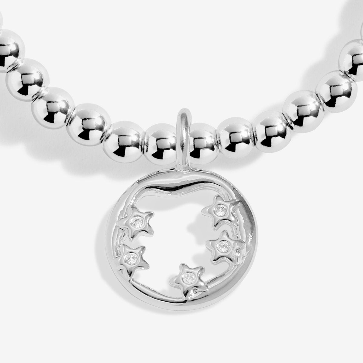 Joma Jewellery silver plated stretch beaded bracelet with hanging charm featuring 5 sparkling stars presented on a sentiment card.