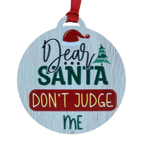 Round wooden Christmas decoration with colourful wording