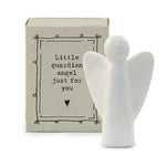 White porcelain angel in cardboard match box