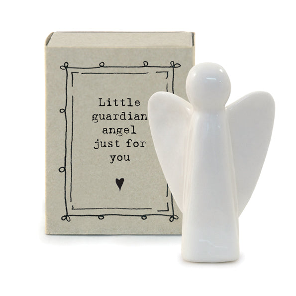 White porcelain angel in cardboard match box