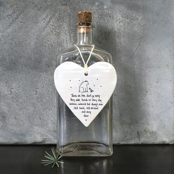 East Of India hanging porcelain wobbly heart with signature style saying Those we love don't go away they walk beside us every day. Unseen, unheard but always near still loved, still missed and very dear.
