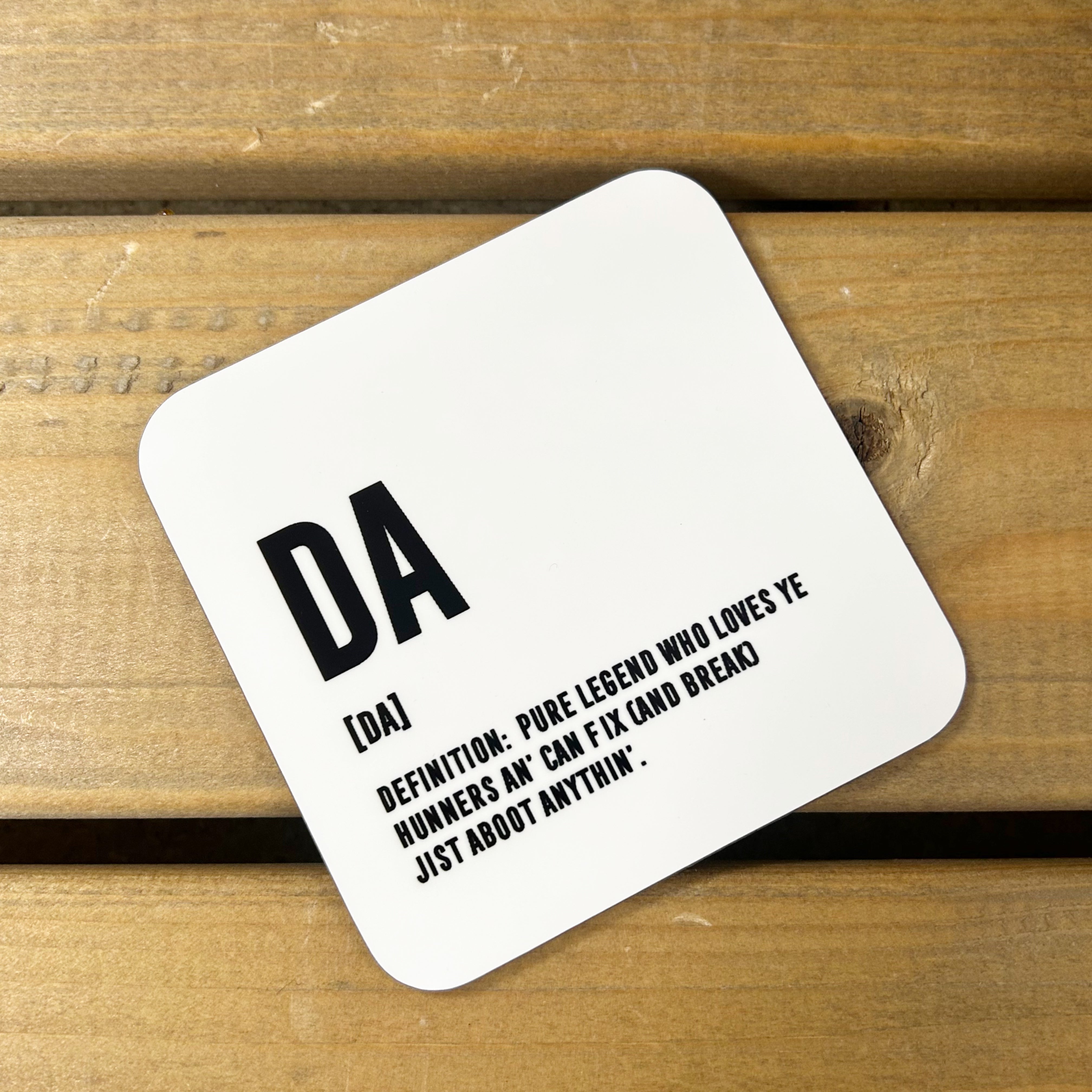 White gloss square 9 x 9 cm coaster with Scottish Da definition in black lettering.