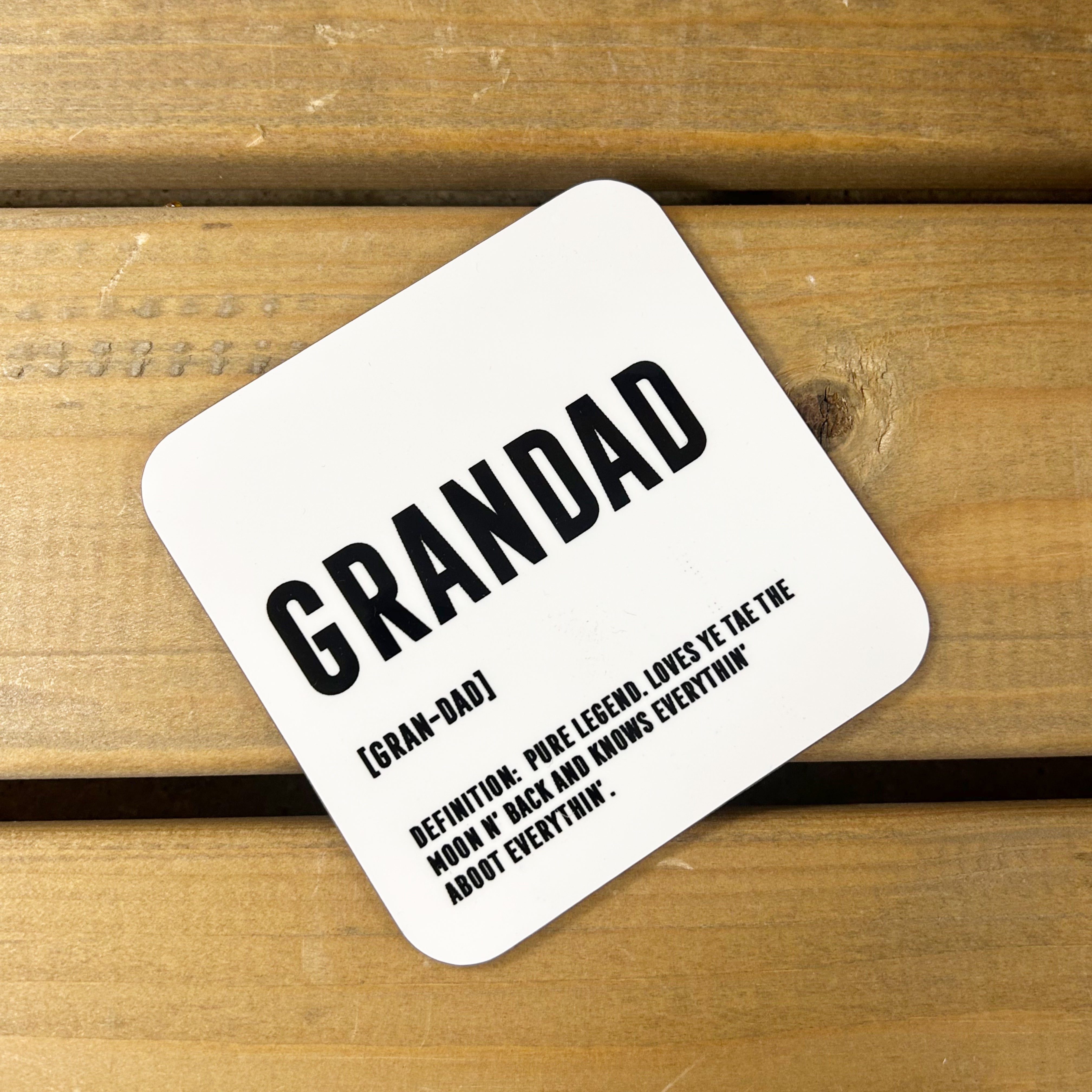 White gloss square 9 x 9 cm coaster with Scottish Grandad definition in black lettering.