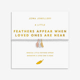 Joma jewellery stretch beaded bracelet with three hanging feather charms in silver, gold and rose gold plating presented on a foil stamped sentiment card.