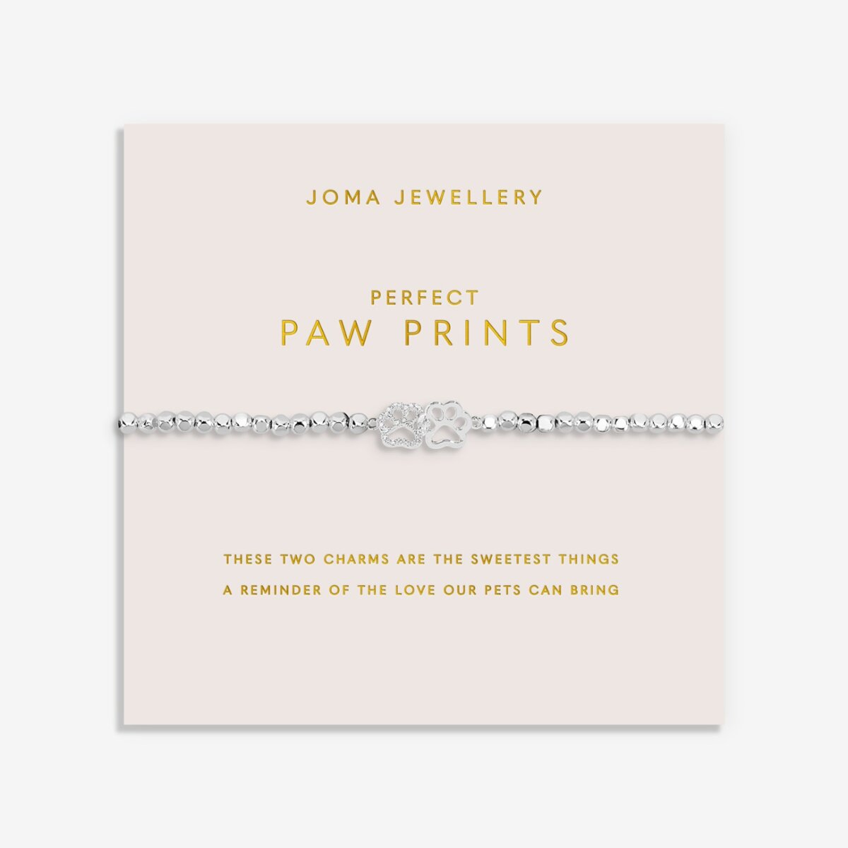 Joma jewellery silver plated stretch beaded bracelet with intertwined paw print charm presented on foil stamped sentiment card.