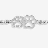Joma jewellery silver plated stretch beaded bracelet with intertwined paw print charm presented on foil stamped sentiment card.