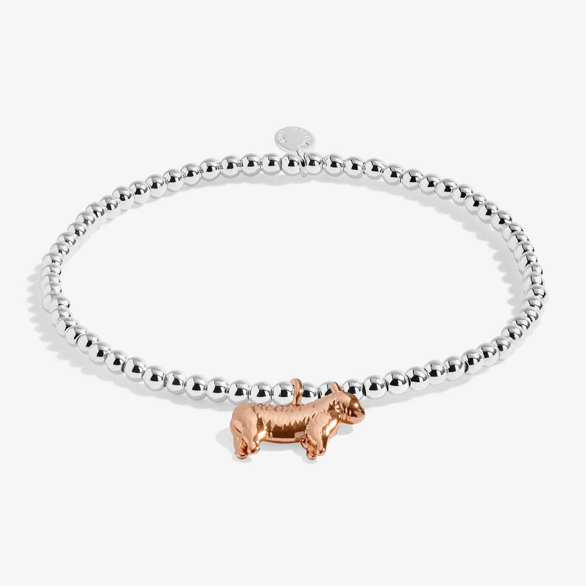 Joma jewellery stretch beaded bracelet with rose gold hanging highland cow charm.