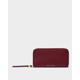 Katie Loxton large vegan leather purse in cherry with gold ton hardware.