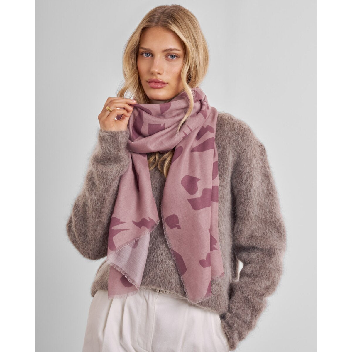 Katie Loxton pink lightweight leopard print scarf with frayed edge detail.