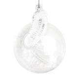 Glass bauble with feather tag