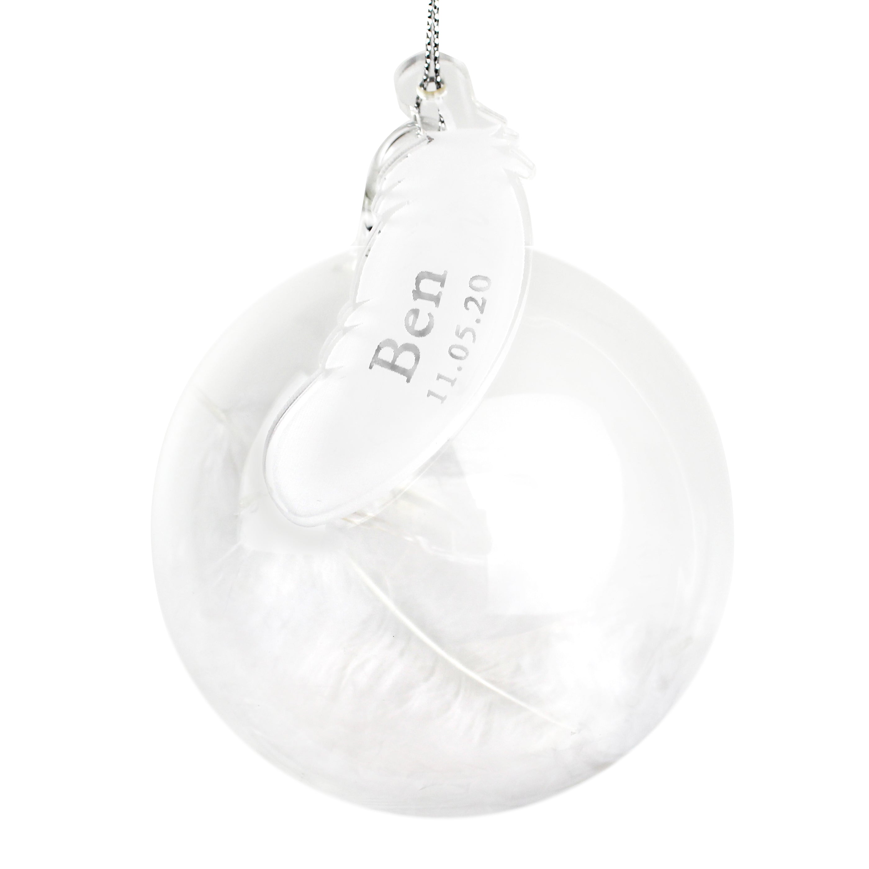 Glass bauble with feather tag