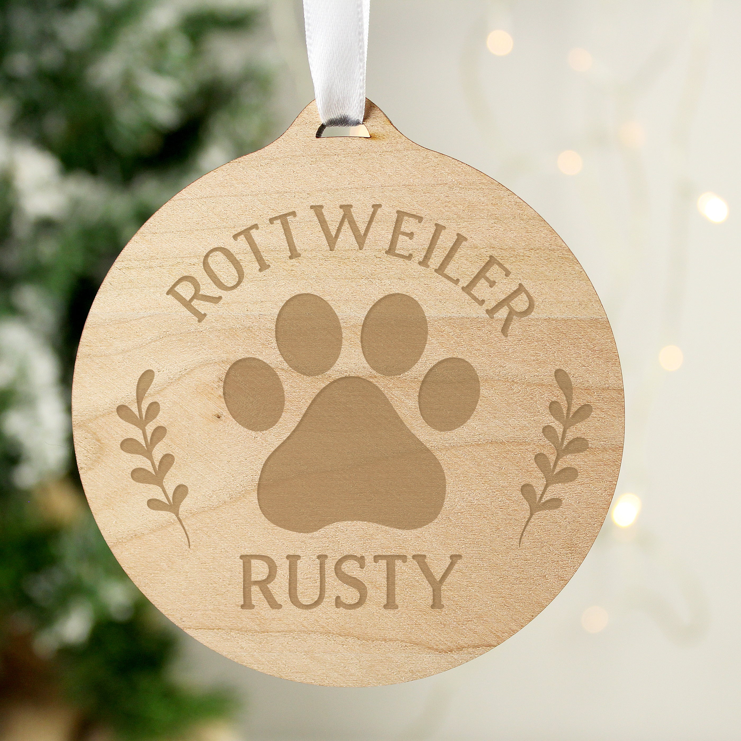 Wooden hanging Christmas decoration with paw print and personalised name
