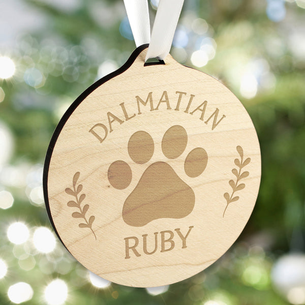 Wooden hanging Christmas decoration with paw print and personalised name