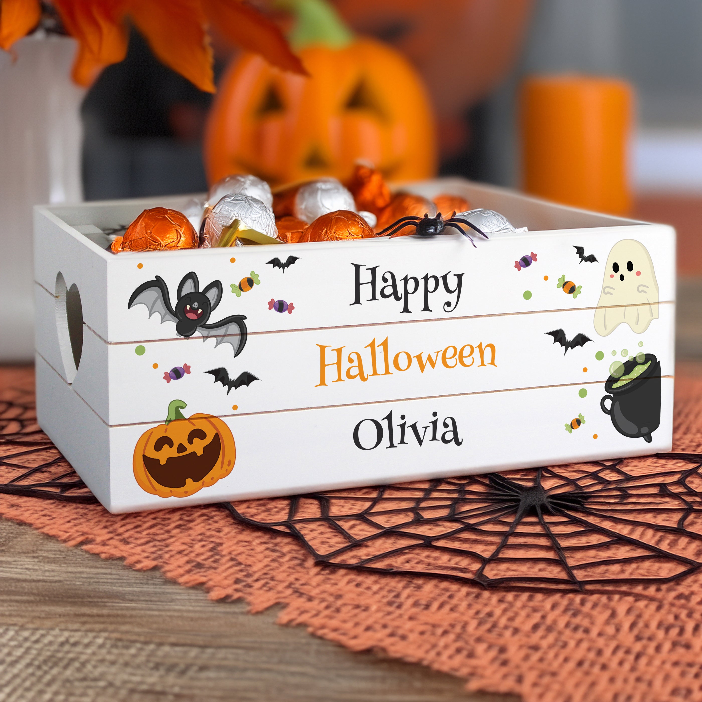 Personalised white crate made from reclaimed wood with a Halloween design.