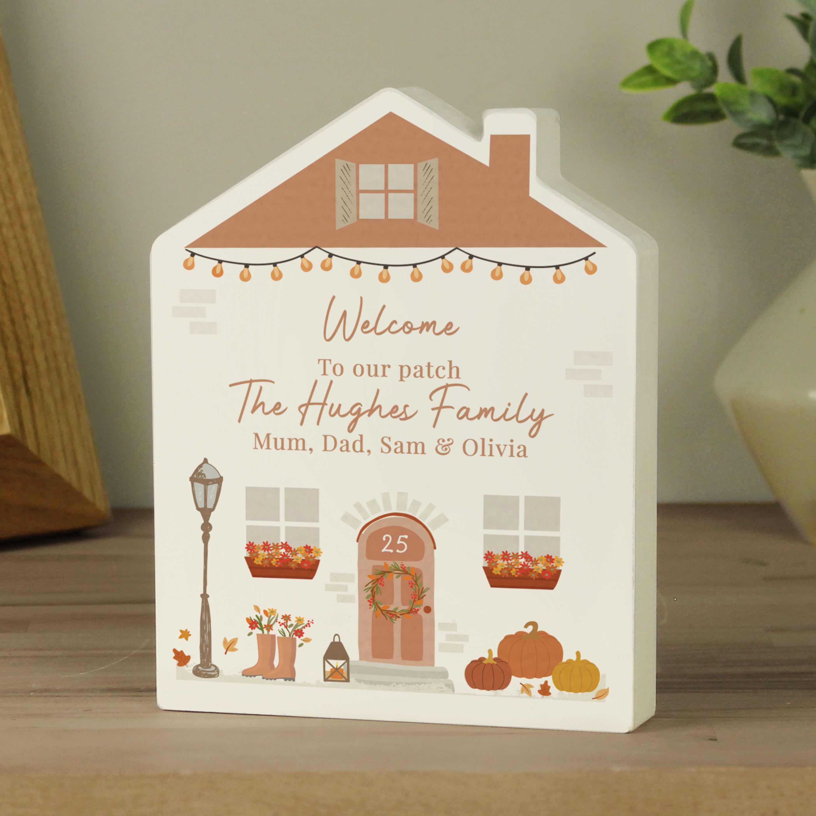 Personalised wooden house ornament for Autumn.