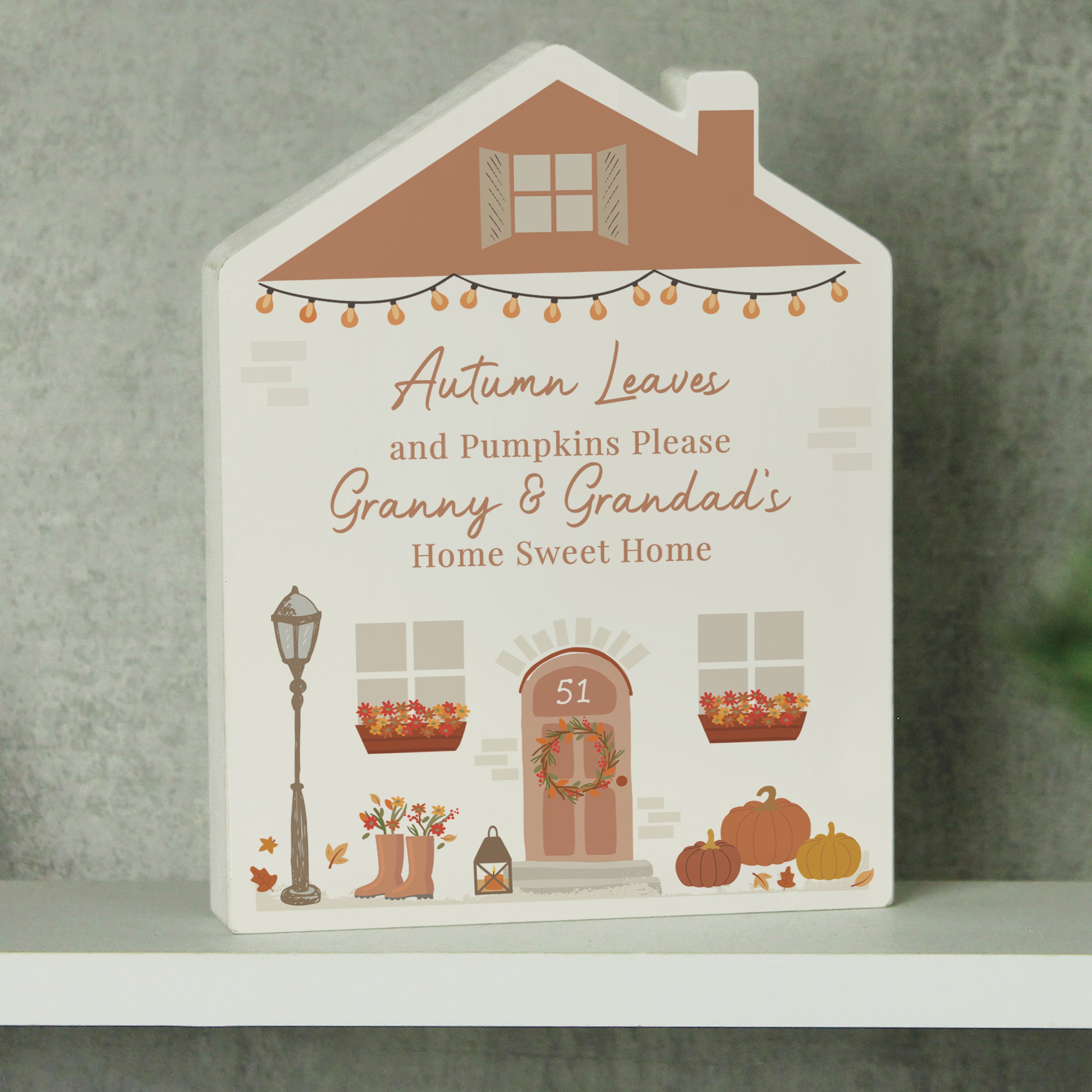 Personalised wooden house ornament for Autumn.