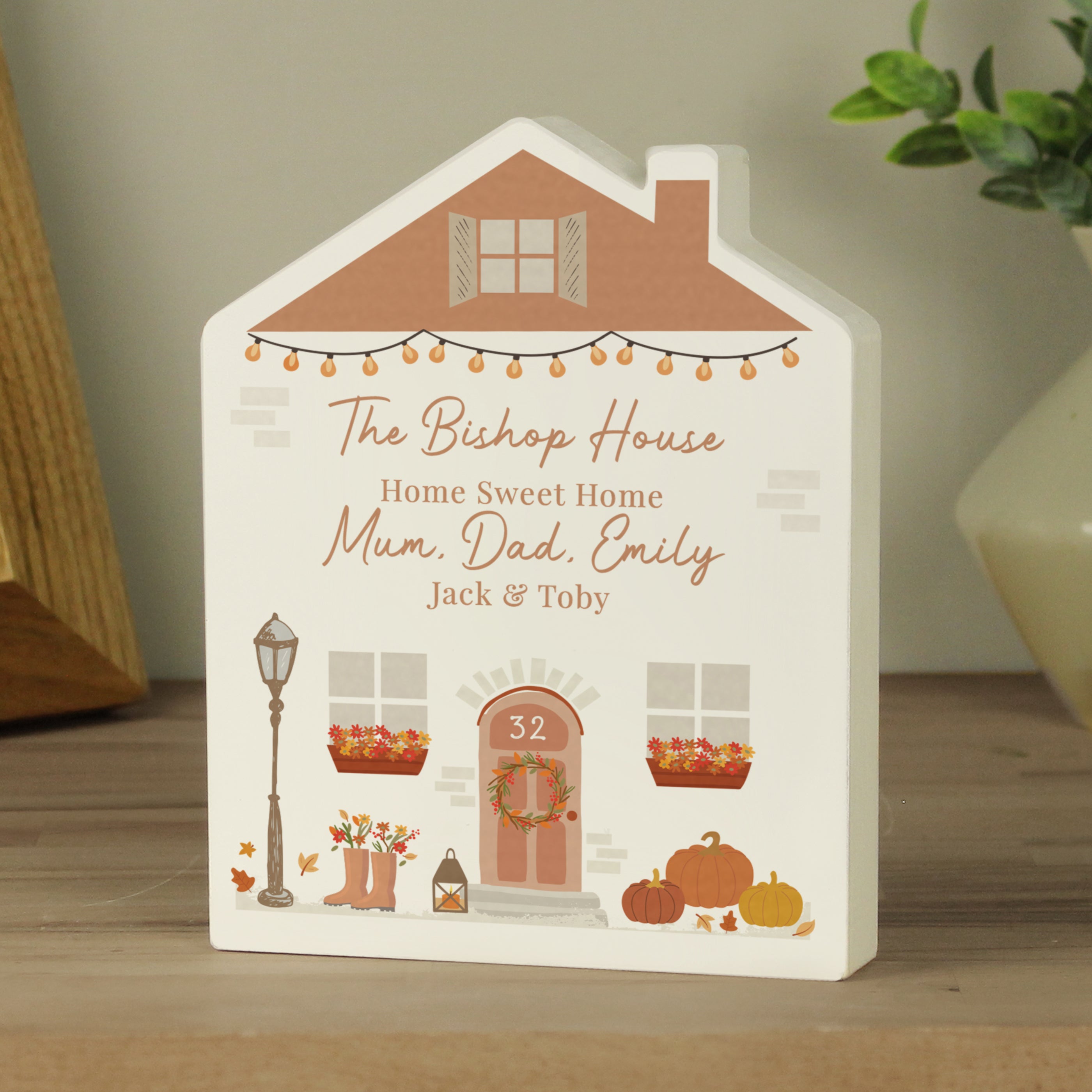 Personalised wooden house ornament for Autumn.