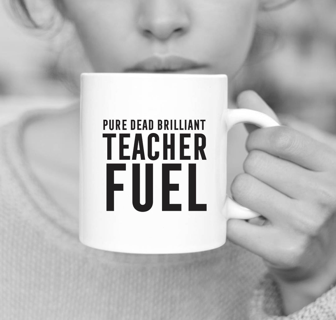 White ceramic 11oz mug with black writing - Pure Dead Brilliant Teacher Fuel