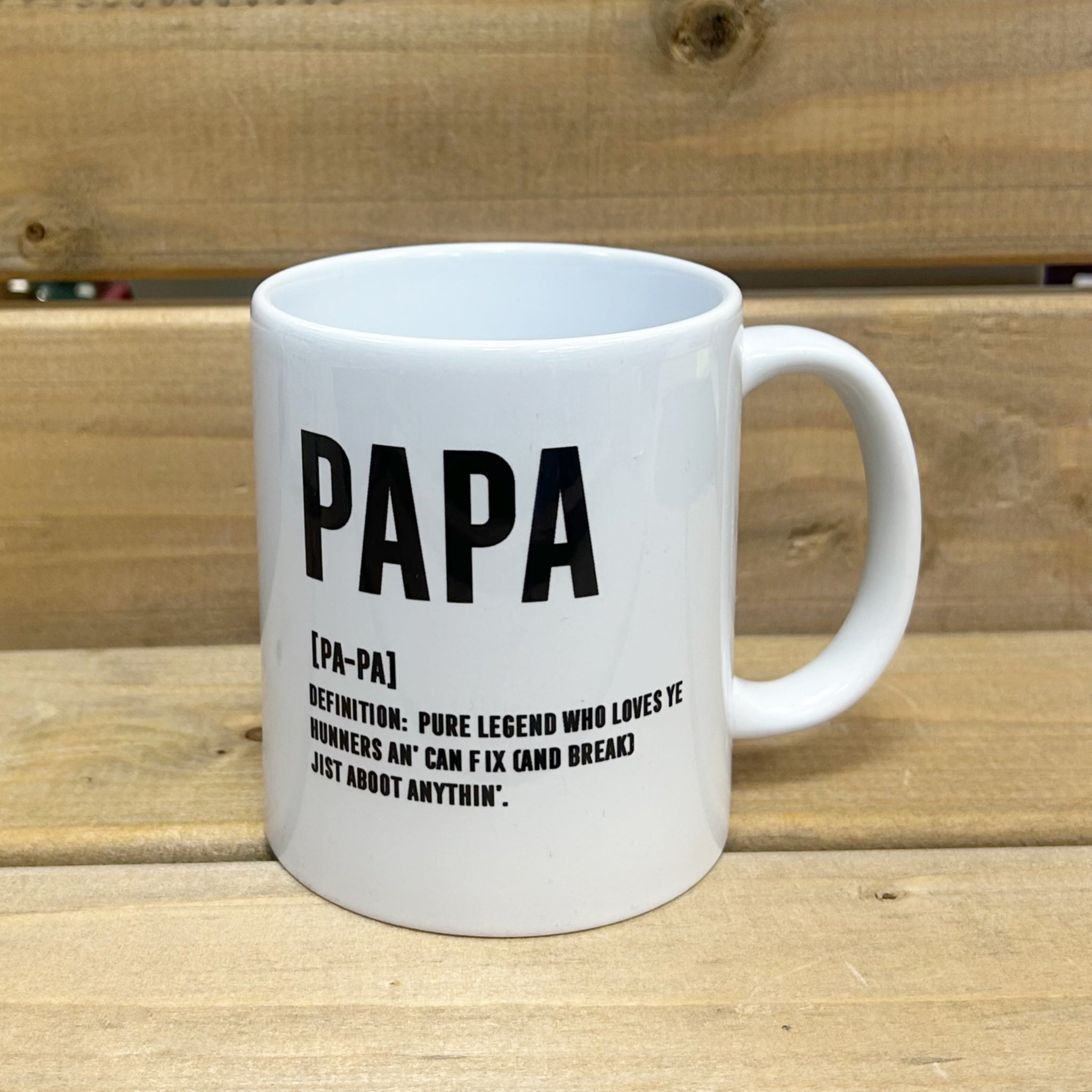 White ceramic 11oz mug with Scottish Papa definition in black print.