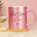 Personalised pink glitter mug with black wording and heart detail.