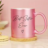 Personalised pink glitter mug with black wording and heart detail.