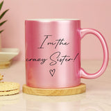 Personalised pink glitter mug with black wording and heart detail.