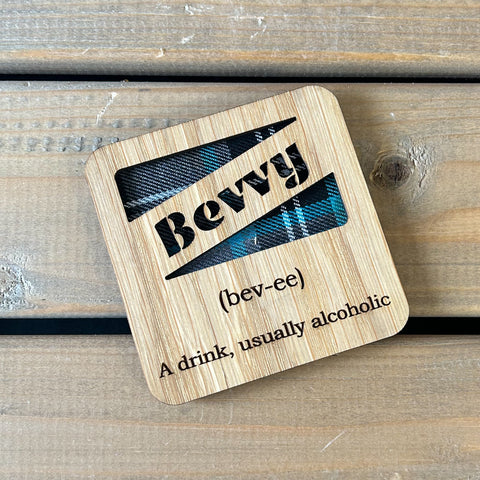 Oak veneer coaster with tartan insert and cut out wording 'Bevvy' with engraved definition.