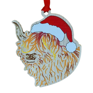 Colourful wooden highland cow with Santa hat Christmas decoration