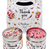 Gift box with two candles one candle text says 'Thank You' the other says 'You're a Star'