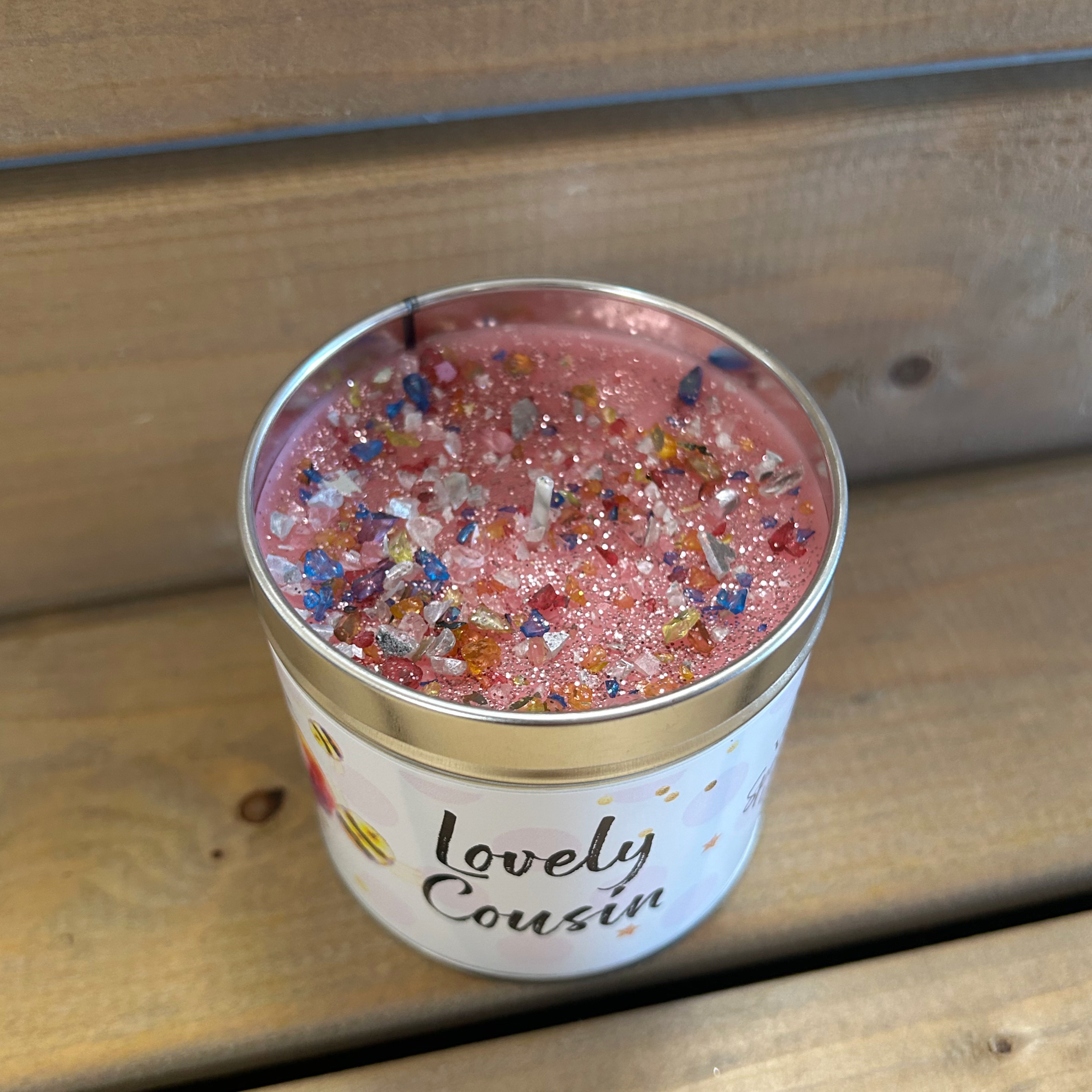 Tin candle with added sparkles with sentiment cousin 