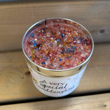 Best Kept Secrets Granddaughter tin candle with sparkle topping.