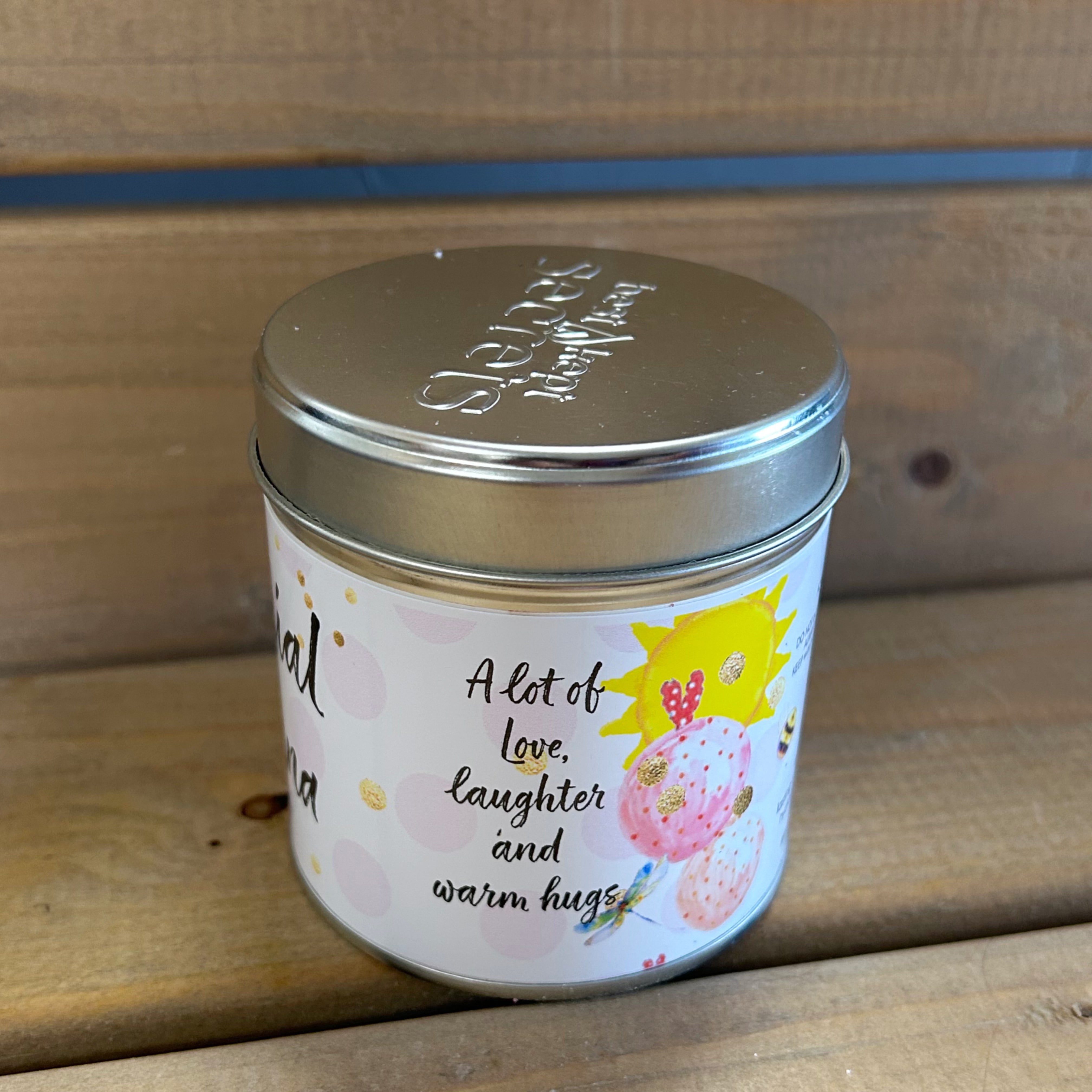 Best Kept Secrets Nana tin candle with sparkle topping.