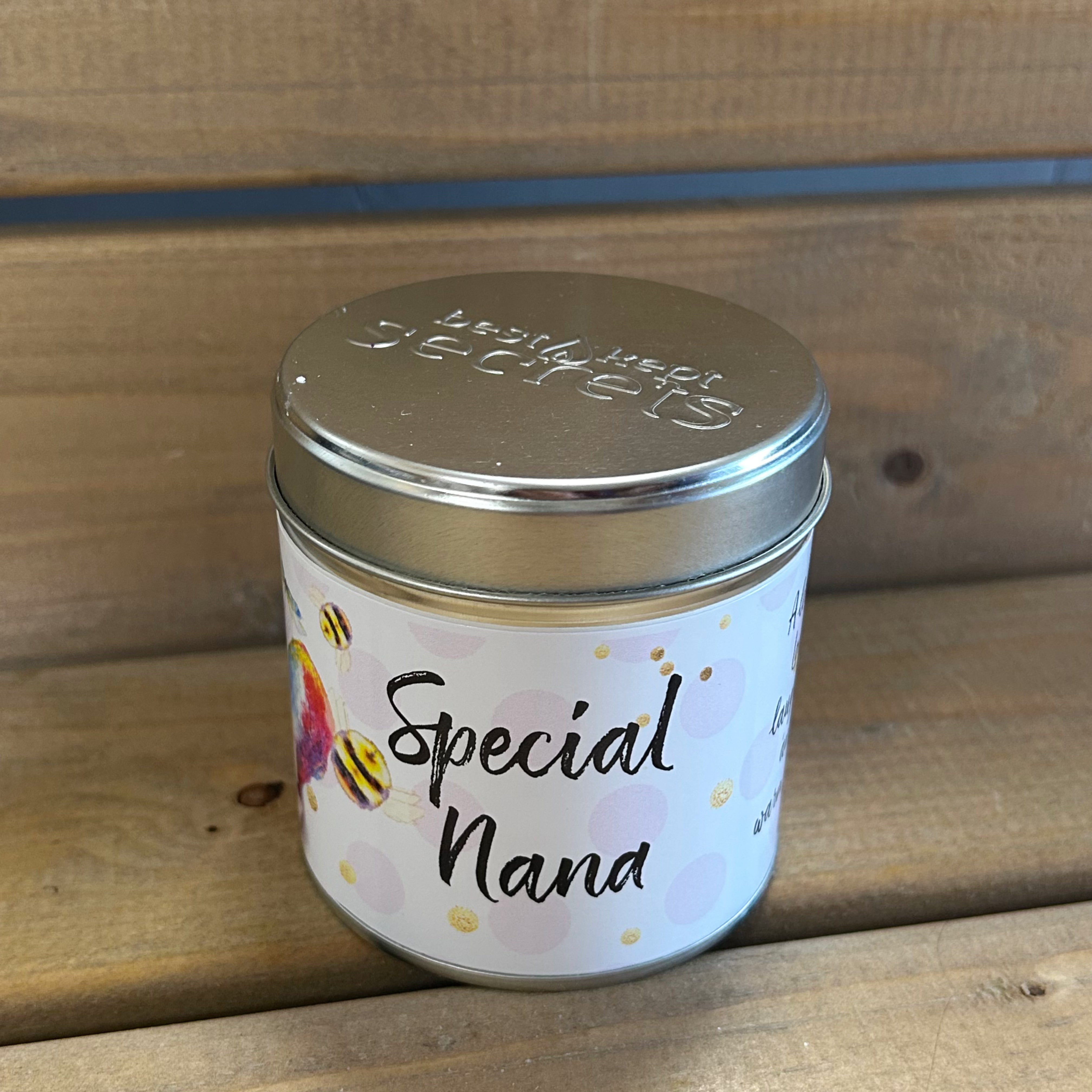 Best Kept Secrets Nana tin candle with sparkle topping.