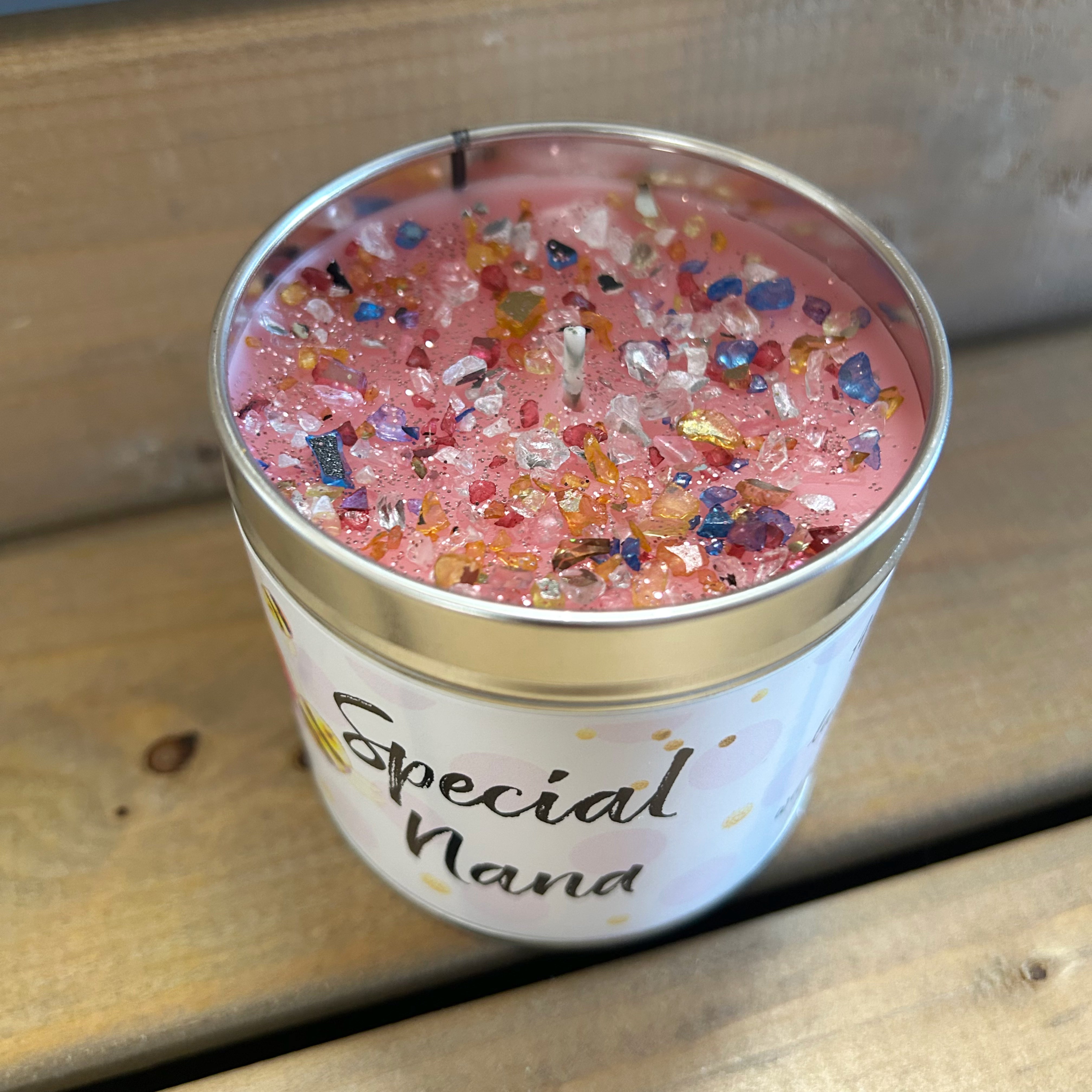 Best Kept Secrets Nana tin candle with sparkle topping.