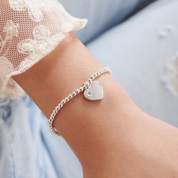 Children's silver beaded bracelet with heart charm
