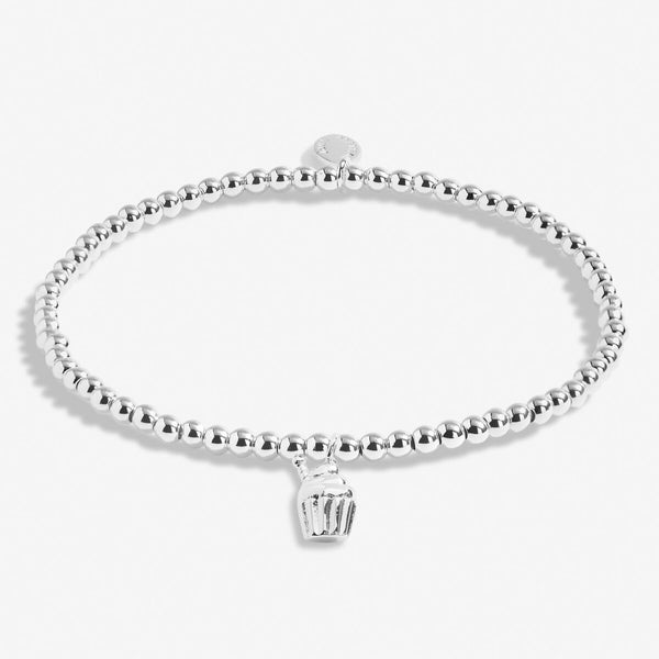 Silver plated beaded stretch bracelet with cupcake charm