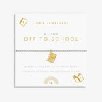 Joma girls beaded bracelet with gold plated book charm