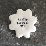 East Of India white porcelain token with black wording 'Really Proud Of You'